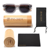 Stylish UV400 wooden sunglasses placed inside a handcrafted bamboo case