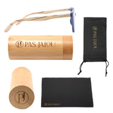 Eco-friendly bamboo case with 'PAS JALOU' engraving, paired with protective soft bag and towellete.