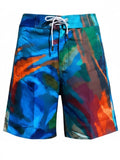 Colorful swim shorts with abstract pattern on a white background