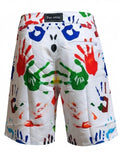 Colorful handprint shorts with a visible brand label on a white background