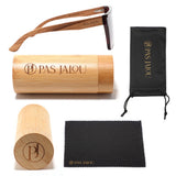 UV400 protective wooden sunglasses resting beside a sustainable bamboo case