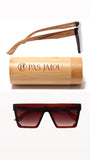 UV400 protective wooden sunglasses resting beside a sustainable bamboo case
