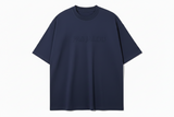 Navy blue t-shirt with pas jalou embossed branding.
