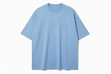 Light blue t-shirt with embossed text (PAS JALOU)