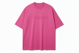 Pink t-shirt with 'PAS JALOU' embossed text on a white background