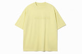 Light yellow t-shirt with 'PAS JALOU' text on a white background
