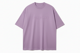 Purple t-shirt with embossed text "pas jalou"